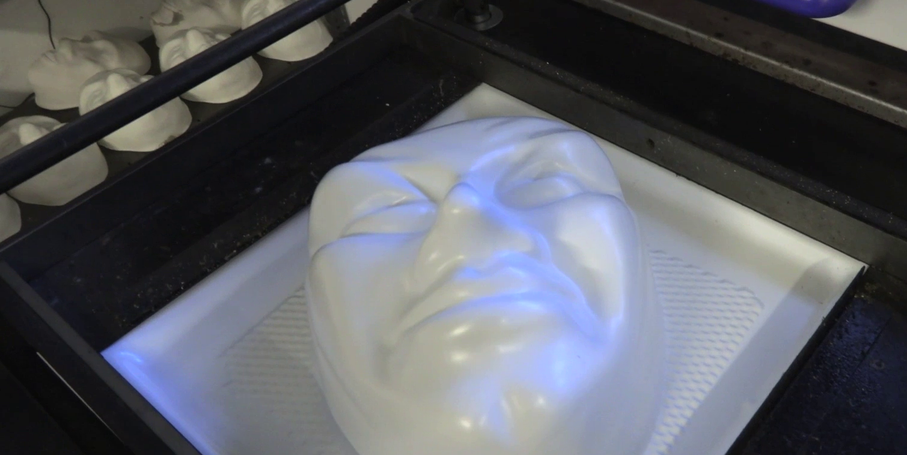 Mask being vacuum formed at Trestle Theatre Company